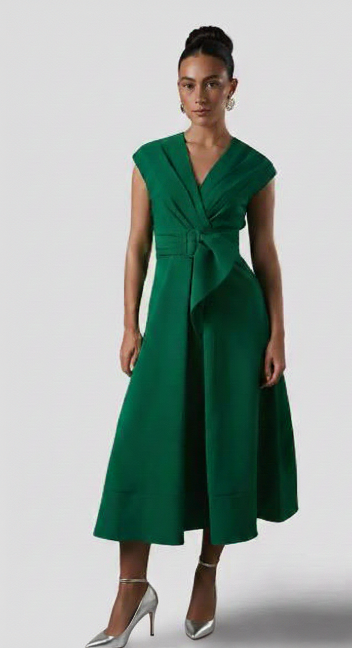 green dress and silver shoes